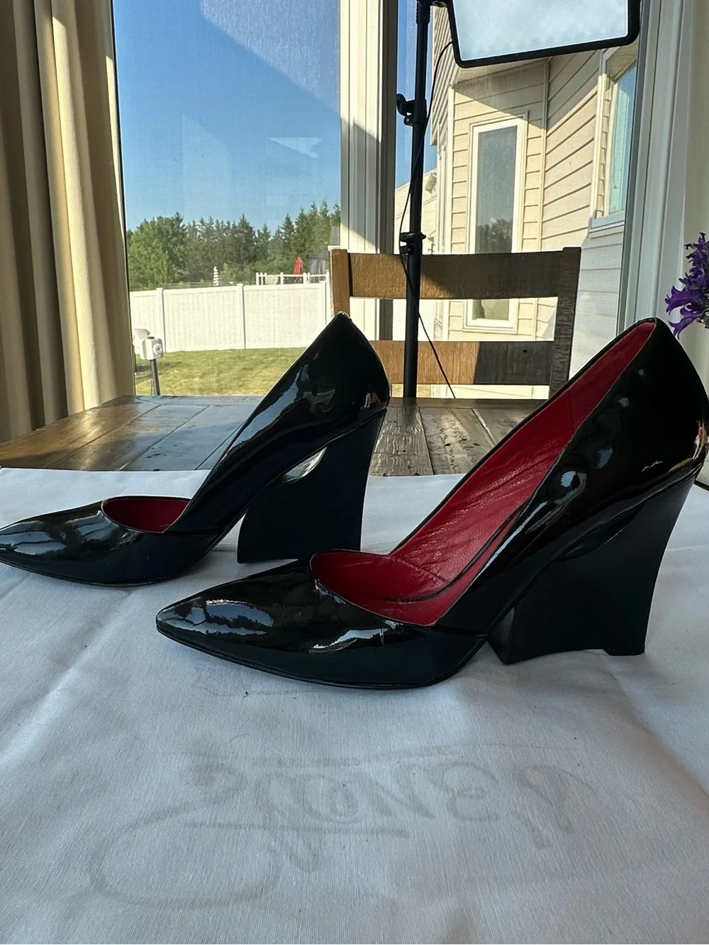 Charles Jourdan Paris black wedge heels with red interior